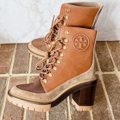 Tory Burch Miller 95 Mm Lug Sole Lace Up Fig Heeled Logo Bootie Boot Brown Leather Suedesize Us 7 Msrp $485 Condition: New Without Box Signature Double "T" Design On The Side Of The Shaft. Round Toe Silhouette. Block Heels. Rubber And Leather Outsole. Measurements: Platform: 1 1/4 In Heel Height: 3 34 In Shaft Height: 5" Tory Burch Boots, T Design, Fancy Shoes, Tory Burch Miller, Brown Leather Boots, Fall Fashion Outfits, Lug Sole, Tory Burch Shoes, Shoe Game