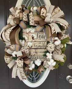 a wreath is hanging on the front door