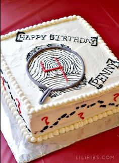 a birthday cake with a fingerprint on it