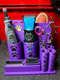 purple caddy with scissors, combs and other items