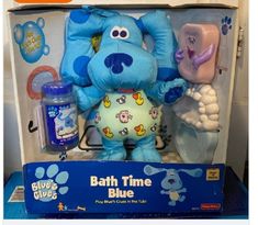 the blue dog bath time toy is in its box and ready to be played with