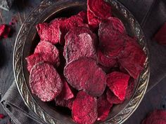 beet chips in a bowl on a table