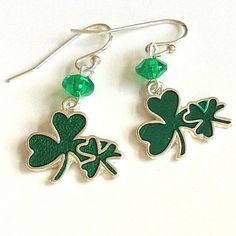 Silver Irish Shamrock Earrings Great For St. Patricks Day Hypo-Allergenic Posts. Lightweight Style. Silver Plated Metal Alloy. Lead & Nickel Free Green Acrylic Bead Accents. Green Baked Enamel. New With Tags. Visit Our Store For More Great Irish Jewelry. Thanks For Looking. Celtic Green, Silver Shamrock, Shamrock Earrings, Irish Clover, Irish Shamrock, Irish Jewelry, Rainbow Jewelry, Irish Celtic, Clover Green