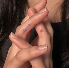 a close up of a person holding their hand with the word punk written on it