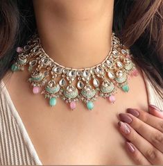 Adorn yourself in timeless elegance with this exquisite mint pink Kundan and zircon necklace set, perfect for weddings and special occasions. Crafted with meticulous attention to detail, the set features delicate  hues reminiscent of Pakistani and Punjabi traditions, with a touch of Bollywood glamour. Complete with matching earrings and a stunning maangtika, this Indian Kundan ensemble effortlessly captures the essence of sophistication and grace. Measurements:   Necklace Length-14" Necklace Wid Wedding Jewellery Indian, Bridal Choker Set, Mint Necklace, Bollywood Glamour, Jewelry Necklace Simple, Bridal Choker, Jewellery Indian, Punjabi Wedding, Choker Set