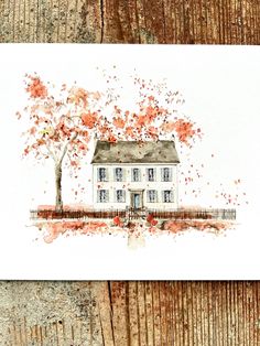 a watercolor painting of a white house with red leaves