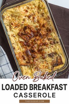 Golden, oven-baked loaded breakfast casserole in a glass dish, topped with crispy melted cheese, herbs, and red pepper flakes. A hearty and flavorful make-ahead meal perfect for breakfast or brunch gatherings.