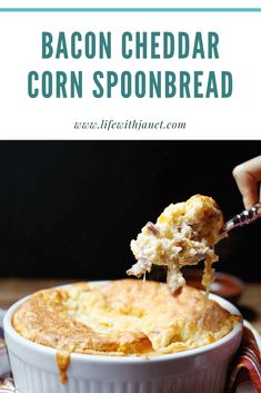 bacon cheddar corn bread in a white casserole dish with a spoon