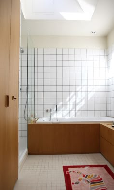 the bathroom is clean and ready to be used as a bathtub or shower stall