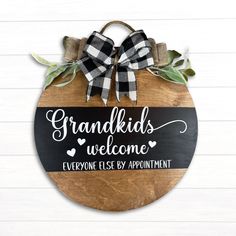 a black and white sign that says grandkids welcome everyone else is by appointment