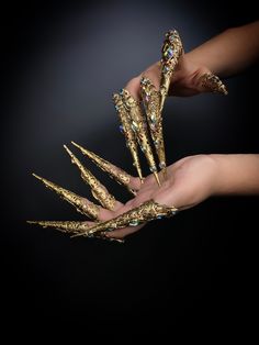 Universal claws on the fingers of gold color decorated with rhinestones. Great props for a photo shoot. You can use them for photography, makeup, or as part of a Halloween costume. Suitable for Gothic Party, Cosplay, Summer Festival, Burning Man, Halloween Party. 100% designed and handmade by our designers ( SETA Design studio in Kyiv).  It will be securely packed in a box. Feel free to contact us if you have any questions.   We accept return. Contact us within 3 days of delivery. Delivery of go Magic Claws Art, Claw Jewelry, Secret Garden Parties, Gothic Nails, Filigree Jewelry, Nail Jewelry, Costume Hats, Summer Festival, Burning Man