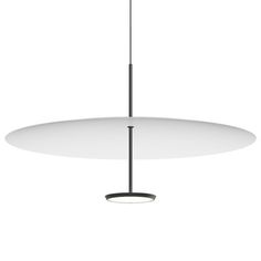 a white circular light fixture hanging from a ceiling