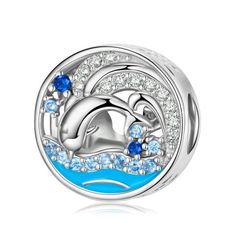 Immerse yourself in the majestic beauty of the ocean with our Jumping Dolphin Ocean Wave European Bead. With dimensions of 11.9mm (0.47"), this petite charm captures the spirit of the sea in a delightful way. Crafted in .925 Sterling Silver, it's embellished with a stunning blue enamel overlay, emulating the ocean waves, and accompanied by sparkling Cubic Zirconia for that extra twinkle. This bead fits beautifully onto any Ginger Lyne 925 Sterling Silver bracelets, chains, or charm holders, whic Jumping Dolphin, Blue Diy, Friend Jewelry, Bracelet Pandora, Sister Jewelry, Daughter Jewelry, Best Friend Jewelry, Necklace For Girlfriend, Pandora Bracelet Charms