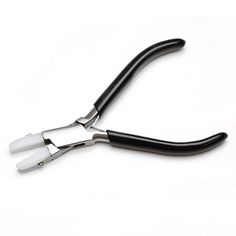 a pair of black handled scissors on a white background