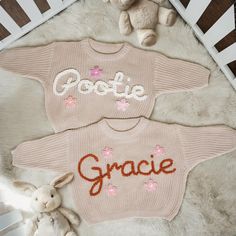 **If you want to ADD A FLOWER, please place your order at the link below. https://www.etsy.com/listing/1610462453/add-a-design?ref=listings_manager_grid Customized Baby and Toddler Sweaters: Personalized Name and Monogram for Your Precious Niece Step into a realm of enchantment with our handcrafted baby and toddler sweaters, each adorned with your child's name in elegant cursive. Meticulously crafted with utmost care, these exceptional heirlooms make for a perfect addition to your little one's wardrobe or a thoughtful gift. Customization Options: Choose from 16 Colors of Sweaters. Up to 97 yarn colors available for selection for name. Four font options available for selection. Personalization Instructions: Provide accurate personalized information; additional details or questions will be a Baby Sweater With Name, Sweater With Name, Hand Embroidered Name, Pull Bebe, Knit Baby Sweaters, Floral Initial, Toddler Sweater, Embroidered Name, Baby Sweater