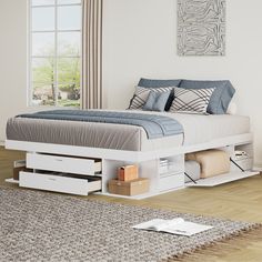 a white bed with drawers underneath it in a room next to a rug and window