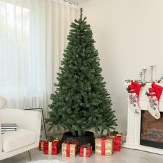 a living room with a christmas tree and presents