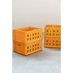 three yellow bins with words written on them