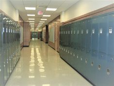 an empty hallway with lockers and the words propensity to discuss