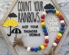 a sign that says count your rainbows, not your thunderstorms on it