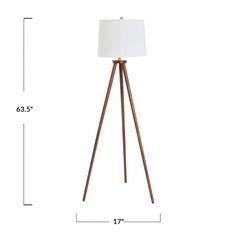 the floor lamp is shown with measurements to fit in front of it, and on top of