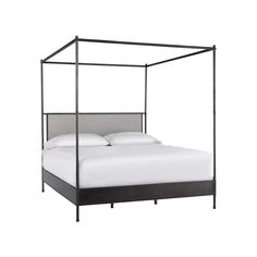 an iron bed frame with white sheets and pillows on the bottom, against a white background