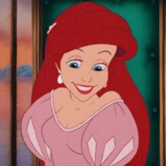 ariel from the little mermaid is smiling