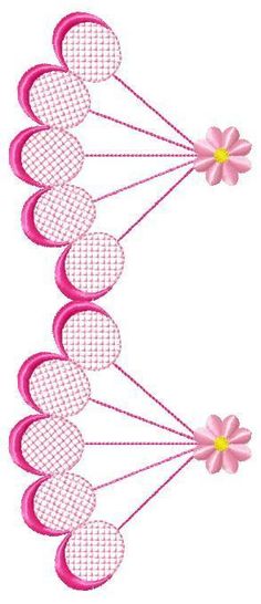 three pink flowers are attached to the side of a white piece of fabric with mesh netting