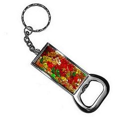 the gummy bear keychain is made out of metal and has a multicolored gummy bear in it