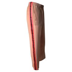 Rare Runway Silk Gucci Pants Brand New w/ Tags $2350 Worn by most of the models for the Spring/Summer 2004 Collection Tom Ford's "Farewell" Spring Collection for Gucci Featured in Many Print Ads Blush Silk Pants Pink & Black Satin Stripes down the sides Elastic & Drawstring Tie Waist Italian Size: 40 IMPOSSIBLE TO FIND NEW Gucci Elegant Straight Pants, Elegant Gucci Straight Leg Pants, Chic Gucci Straight Leg Pants, Elegant Gucci Straight Leg Bottoms, Gucci Trousers For Work, Gucci Trousers For Workwear, Gucci Workwear Trousers, Luxury Straight Leg Gucci Pants, Gucci Straight Leg Work Bottoms