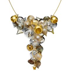 Golden Meringue Necklace by Melissa Schmidt. This necklace is made of approximately 30 individual borosilicate glass blown bubbles, which are loose and free floating on the wire so they can be spread out as desired. Three are bell shaped and coated in 14k gold foil. One includes slide film image of a bird. There is also a silk tread in one bubble and some gold foil paper in another. In addition glass powder and frit have been utilized for color and texture. A tiny origami cast gold plated crane Diy Bangle Bracelets, Leather Jewelry Diy, Gold Foil Paper, Glass Bubble, Accesories Jewelry, Bubble Necklaces, Easy Diy Jewelry, Artful Home, Foil Paper