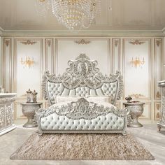 a luxurious bedroom with white furniture and chandelier