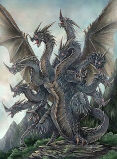 a large dragon with two smaller ones on it's back and wings spread out