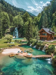 an aerial view of a house on the water with a dock in front of it