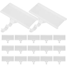 a set of white plastic dividers and clips