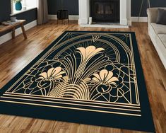 a living room area rug with an art deco design in gold and black on a wood floor