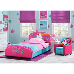 a child's bedroom decorated in pink, blue and purple