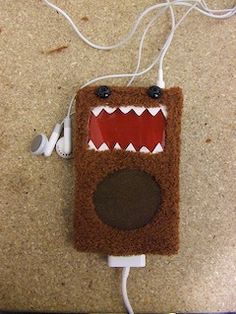 a cell phone made to look like a monster