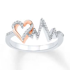 This expressive ring for her features a 10K rose gold heart complemented by a sterling silver heartbeat, both decorated in round diamonds. The ring has a total diamond weight of 1/15 carat. Heartbeat Ring, Heart Beat Ring, Hammered Silver Jewelry, Cute Rings, Girly Jewelry, Stylish Jewelry, Gold Heart, Pretty Jewellery, 10k Gold