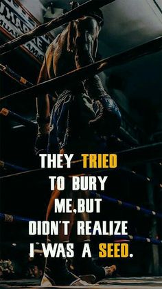 a wrestler standing in the middle of a wrestling ring with words above him that reads they tried to bury me, but didn't realize i was a seed