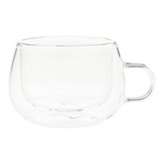 a clear glass cup with a handle on the bottom and inside is shown in front of a white background