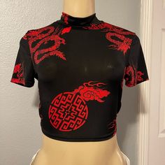 New Very Sexy And Comfy. Edgy Red Top For Night Out, Black Stretch Crop Top With Graphic Print, Red Stretch Edgy Top, Fitted Red Crop Top With Graphic Print, Edgy Red Tops For Club, Fitted Crop Top With Graphic Print For Night Out, Fitted Red Top In Edgy Style, Trendy Black Fitted Crop Top, Red Fitted Crop Top For Club