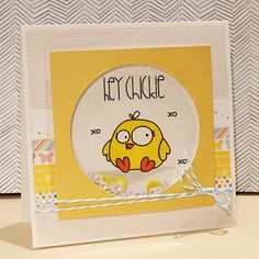 a close up of a greeting card with a bird on the front and words hey chickie