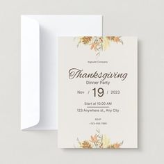 a thanksgiving dinner party card with watercolor flowers on the front and bottom, in white envelope