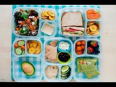 a plastic container filled with lots of different types of vegetables and food on top of it