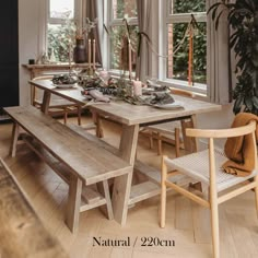 a wooden table with two chairs and a bench