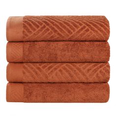 three orange towels stacked on top of each other