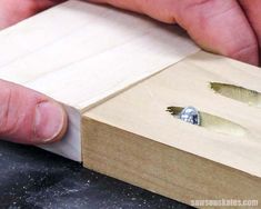 a person is working with woodworking tools on a piece of plywood and glue