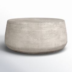 a white bowl sitting on top of a table