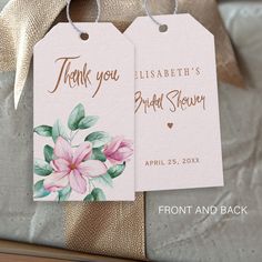 two tags with pink flowers on them are hanging from a ribbon and the tag says, thank you, elizabeth's bridal